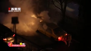 آتش‌ زدن تاکسی توسط یک تخریبگر در میدان فردوسی