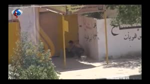فیلم/خطر کردن یک عضو «حشد الشعبی» عراق برای نجات یک معلول