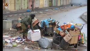 مخفی شدن سربازان صهیونیسم در سطل زباله