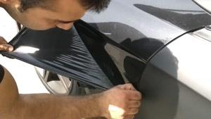 کندن روکش برچسب بدون آسیب به رنگ خودرو