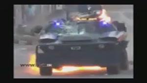 حمله معترضین به خودروی ال خلیفه