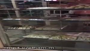 مترو مفتح ویترین شیرینی فروشی ۹۶/۲/۱۷موش درحال خور دن شیرینی