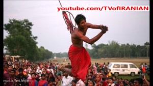 فستیوال دیوانه وار مردان معلق با سیخ های آهنی در هند و بنگلادش!