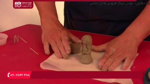 کلیپ آموزش مجسمه سازی (نحوه ساختن ظرف آبنبات با پایه فرشته)