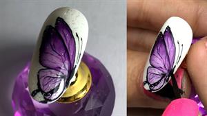 طراحی آب رنگی پروانه روی ناخن 