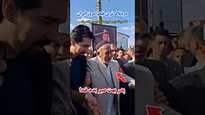 نگاه دردناک پدر صابر کاظمی به عکس پسرش