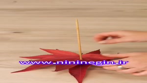 ساخت  آدمک با برگ درختان پاییزی